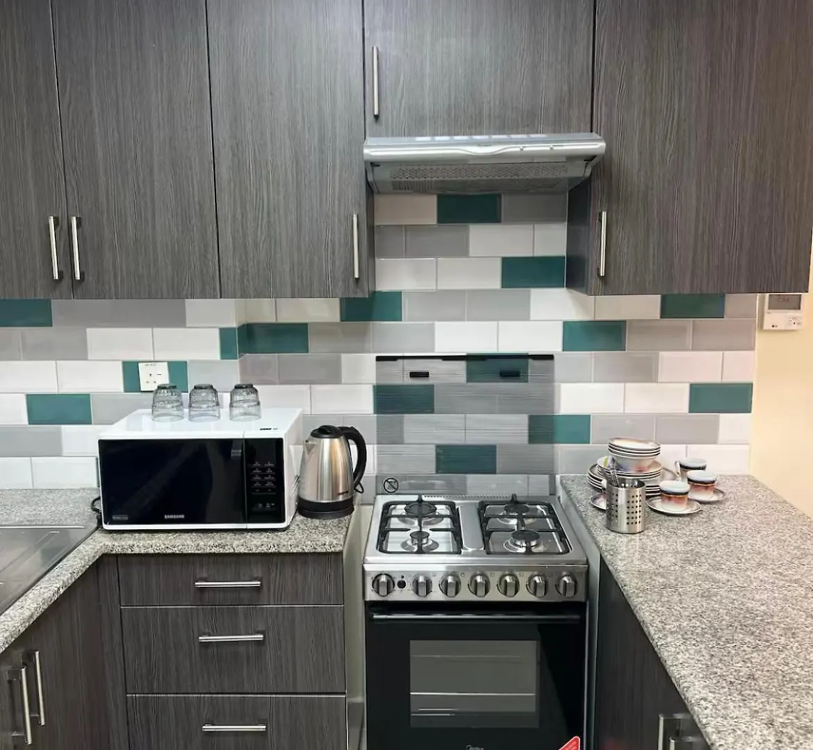 Apartament Alzahia Garden Szardża